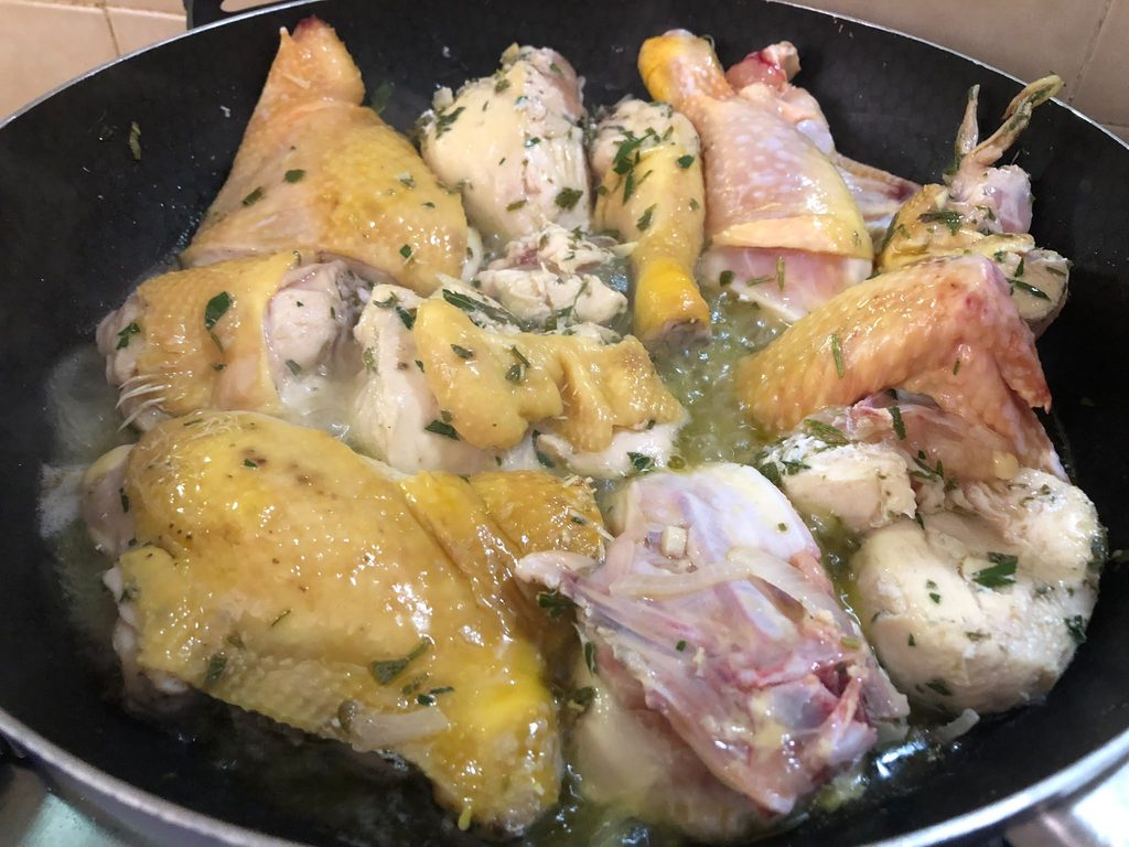 Italian chicken stew with tomato sauce, red wine and bay leaf